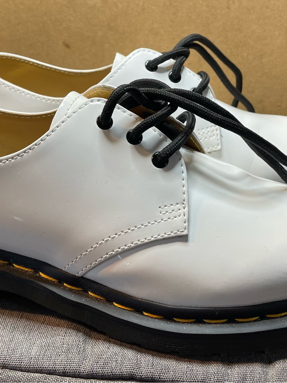Dr. Martens White Leather Derby Shoes with Black Laces